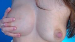Teasing With Full Milky Tits.