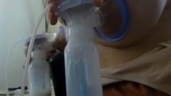 Dilettant Milking And Pumping Massive Lactating Boobies